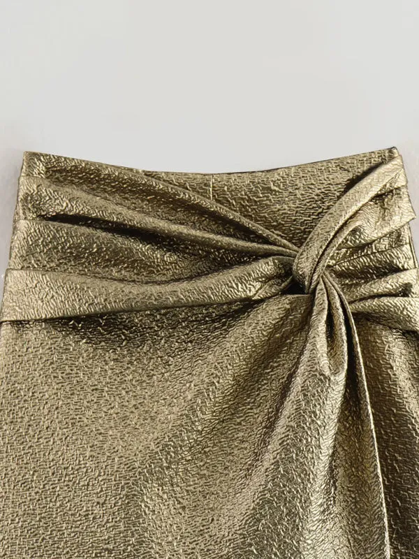 Women's metallic shiny knotted pleated shorts